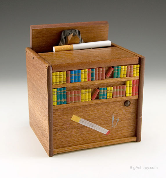 Dog in Musical Book Cabinet Delivers Your Smoke